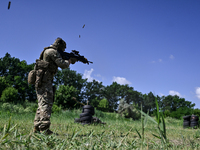 A soldier of a reconnaissance unit of the 128th separate mountain assault brigade of the Zakarpattia region is partaking in a fire training...