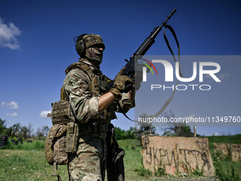 A soldier of a reconnaissance unit of the 128th separate mountain assault brigade of the Zakarpattia region is partaking in a fire training...