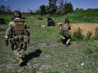 A combat squad of a reconnaissance unit of the 128th separate mountain assault brigade of the Zakarpattia region is being seen before the st...