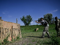 A combat squad of a reconnaissance unit of the 128th separate mountain assault brigade of the Zakarpattia region is being seen before the st...