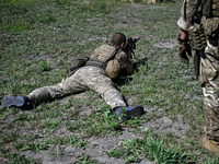 A combat squad of a reconnaissance unit of the 128th separate mountain assault brigade of the Zakarpattia region is being seen before the st...