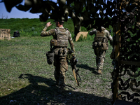 A combat squad of a reconnaissance unit of the 128th separate mountain assault brigade of the Zakarpattia region is being seen before the st...