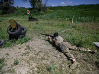 A soldier of a reconnaissance unit of the 128th separate mountain assault brigade of the Zakarpattia region is partaking in a fire training...