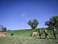 A soldier of a reconnaissance unit of the 128th separate mountain assault brigade of the Zakarpattia region is partaking in a fire training...