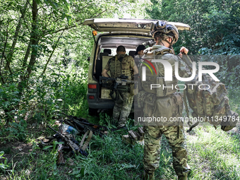 A combat squad of a reconnaissance unit of the 128th separate mountain assault brigade of the Zakarpattia region is being seen before the st...