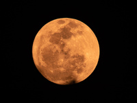 The Strawberry Moon is being seen in Ungaran, Central Java Province, Indonesia, on June 21, 2024. (