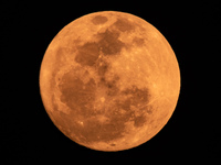 The Strawberry Moon is being seen in Ungaran, Central Java Province, Indonesia, on June 21, 2024. (