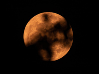 The Strawberry Moon is being seen in Ungaran, Central Java Province, Indonesia, on June 21, 2024. (