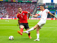 Marko Arnautovic, Jakub Kiwior are playing during the UEFA Euro 2024 Group D match between Poland v Austria, at the Olympiastadion in Berlin...