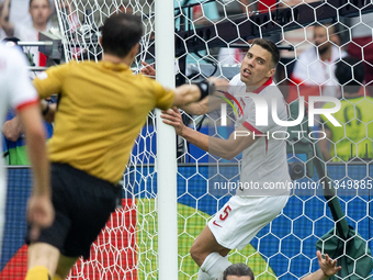 Marcel Sabitzer, Jan Bednarek are  playing during the UEFA Euro 2024 Group D match between Poland v Austria, at the Olympiastadion in Berlin...