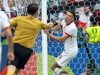 Marcel Sabitzer, Jan Bednarek are  playing during the UEFA Euro 2024 Group D match between Poland v Austria, at the Olympiastadion in Berlin...