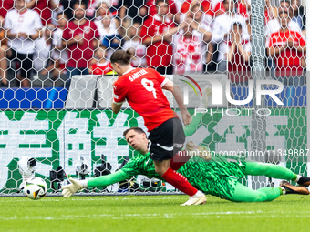 Marcel Sabitzer, Wojciech Szczesny  are playing during the UEFA Euro 2024 Group D match between Poland v Austria, at the Olympiastadion in B...