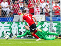 Marcel Sabitzer, Wojciech Szczesny  are playing during the UEFA Euro 2024 Group D match between Poland v Austria, at the Olympiastadion in B...