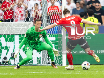 Wojciech Szczesny, Marcel Sabitzer  are playing during the UEFA Euro 2024 Group D match between Poland v Austria, at the Olympiastadion in B...