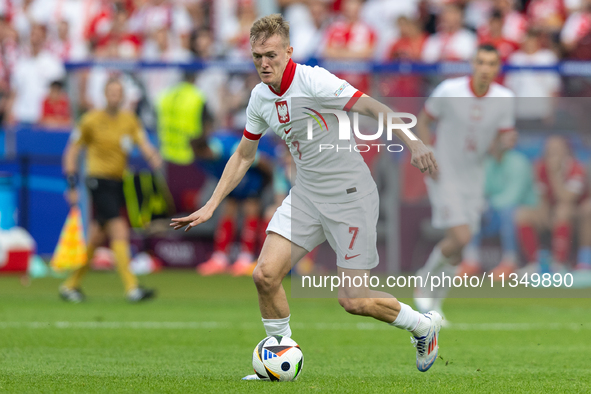 Karol Swiderski  is playing during the UEFA Euro 2024 Group D match between Poland v Austria, at the Olympiastadion in Berlin,Germany, on Ja...