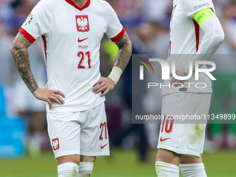 Nicola Zalewski, Piotr Zielinski  are playing during the UEFA Euro 2024 Group D match between Poland v Austria, at the Olympiastadion in Ber...