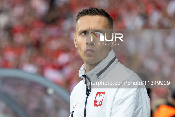 Przemyslaw Frankowski  is walking onto the pitch during the UEFA Euro 2024 Group D match between Poland v Austria, at the Olympiastadion in...