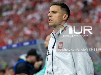 Jan Bednarek  is walking onto the pitch during the UEFA Euro 2024 Group D match between Poland v Austria, at the Olympiastadion in Berlin,Ge...