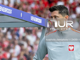 Robert Lewandowski  is standing during the UEFA Euro 2024 Group D match between Poland v Austria, at the Olympiastadion in Berlin,Germany, o...