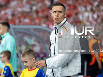 Przemyslaw Frankowski  is walking onto the pitch during the UEFA Euro 2024 Group D match between Poland v Austria, at the Olympiastadion in...