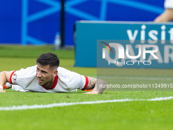 Jakub Moder  is playing during the UEFA Euro 2024 Group D match between Poland v Austria, at the Olympiastadion in Berlin,Germany, on Januar...