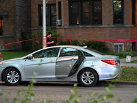 A vehicle is being damaged by bullet holes and blood at the crime scene. Three teenagers are being shot, with one dead, in a shooting in Chi...