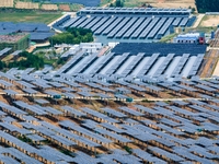 A general view of an agricultural 40 MW new energy photovoltaic power plant is being seen in the West Coast New Area of Qingdao, Shandong pr...