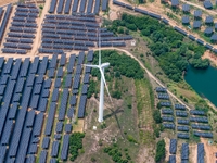 A general view of an agricultural 40 MW new energy photovoltaic power plant is being seen in the West Coast New Area of Qingdao, Shandong pr...