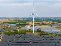 A general view of an agricultural 40 MW new energy photovoltaic power plant is being seen in the West Coast New Area of Qingdao, Shandong pr...