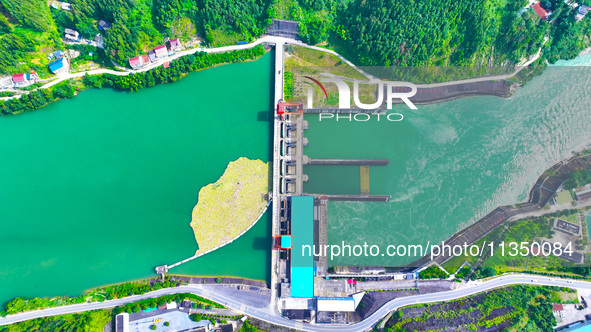 A hydropower plant is being seen in Guizhou province, China, on June 22, 2024. 