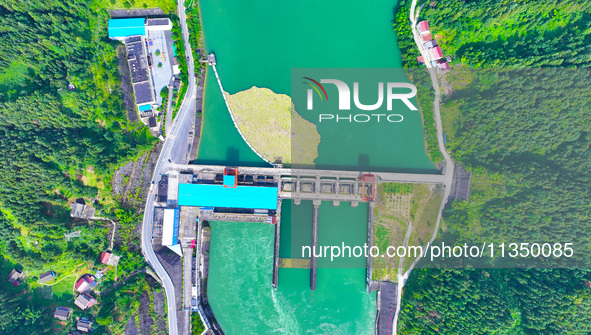 A hydropower plant is being seen in Guizhou province, China, on June 22, 2024. 