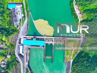 A hydropower plant is being seen in Guizhou province, China, on June 22, 2024. (