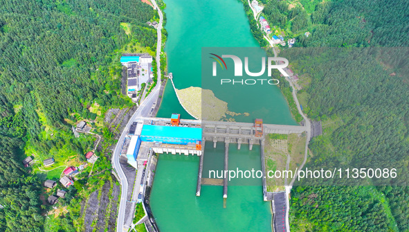 A hydropower plant is being seen in Guizhou province, China, on June 22, 2024. 