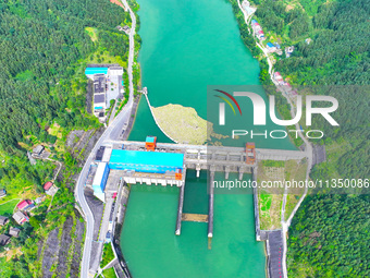 A hydropower plant is being seen in Guizhou province, China, on June 22, 2024. (