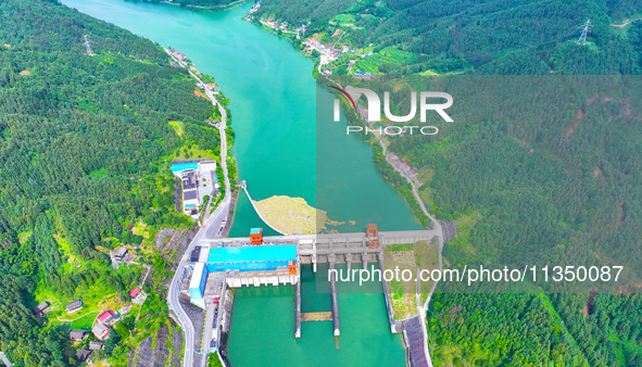 A hydropower plant is being seen in Guizhou province, China, on June 22, 2024. 