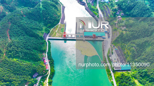 A hydropower plant is being seen in Guizhou province, China, on June 22, 2024. 