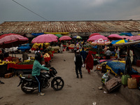 People are purchasing fruits on a cloudy day in Srinagar, Jammu and Kashmir, India, on June 22, 2024 (