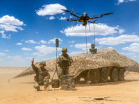 Officers and soldiers are conducting intelligence reconnaissance during a live-fire tactical exercise in Jiuquan, Gansu province, China, on...