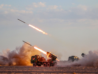 A rocket launcher unit is conducting collective fire during a live-fire tactical drill in Jiuquan, Gansu province, China, on June 20, 2024....