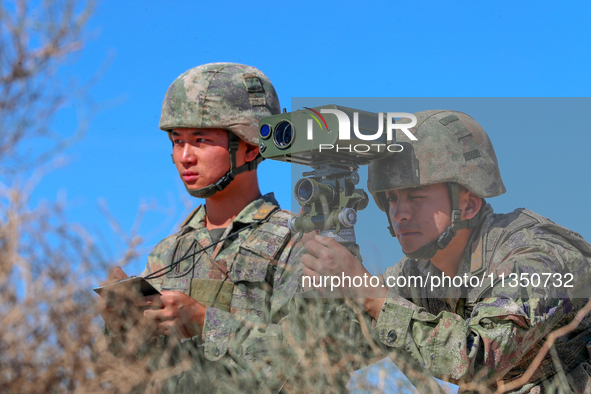 Officers and soldiers are quickly capturing targets during a live-fire tactical drill in Jiuquan, Gansu province, China, on June 20, 2024. 