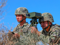 Officers and soldiers are quickly capturing targets during a live-fire tactical drill in Jiuquan, Gansu province, China, on June 20, 2024. (