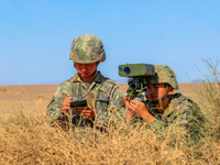 Officers and soldiers are quickly capturing targets during a live-fire tactical drill in Jiuquan, Gansu province, China, on June 20, 2024. (