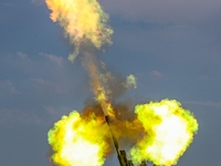 An artillery unit is conducting extreme firing during a live-fire tactical drill in Jiuquan, Gansu province, China, on June 20, 2024. (