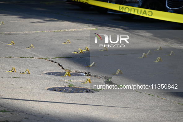 Shell casings are being located at the crime scene. A 34-year-old male victim is being shot multiple times and killed in Chicago, Illinois,...