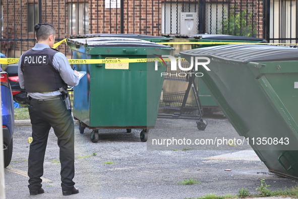 Shell casings are being located at the crime scene. A 34-year-old male victim is being shot multiple times and killed in Chicago, Illinois,...