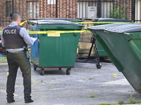 Shell casings are being located at the crime scene. A 34-year-old male victim is being shot multiple times and killed in Chicago, Illinois,...