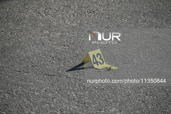 Shell casing is being located at the crime scene. A 34-year-old male victim is being shot multiple times and killed in Chicago, Illinois, Un...