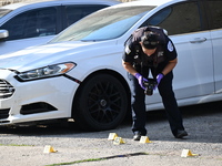 Shell casings are being located at the crime scene. A 34-year-old male victim is being shot multiple times and killed in Chicago, Illinois,...