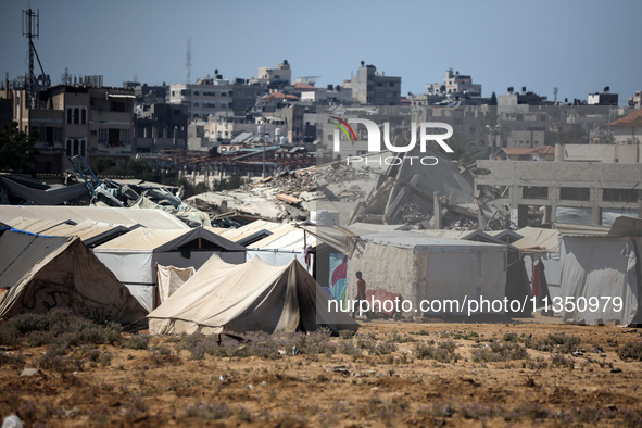 A general view is showing the displaced persons' tents in al-Bureij refugee camp in the central Gaza Strip, on June 22, 2024, amid the ongoi...