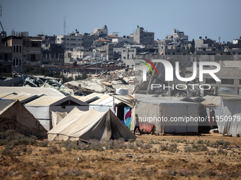 A general view is showing the displaced persons' tents in al-Bureij refugee camp in the central Gaza Strip, on June 22, 2024, amid the ongoi...